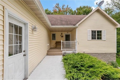 Enjoy easy one-level living on over 1.5 beautifully treed acres on Deacons Lodge Golf Course in Minnesota - for sale on GolfHomes.com, golf home, golf lot