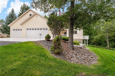 Enjoy easy one-level living on over 1.5 beautifully treed acres on Deacons Lodge Golf Course in Minnesota - for sale on GolfHomes.com, golf home, golf lot