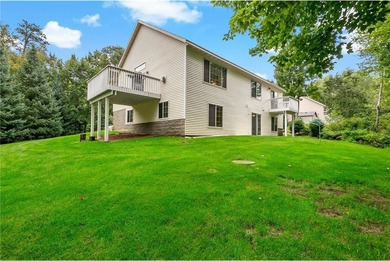 Enjoy easy one-level living on over 1.5 beautifully treed acres on Deacons Lodge Golf Course in Minnesota - for sale on GolfHomes.com, golf home, golf lot