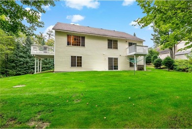 Enjoy easy one-level living on over 1.5 beautifully treed acres on Deacons Lodge Golf Course in Minnesota - for sale on GolfHomes.com, golf home, golf lot