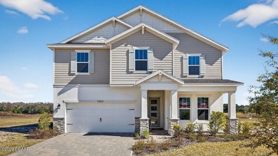 Welcome to The Lydia, a CFB Award-winning home that blends on LPGA International Golf Course in Florida - for sale on GolfHomes.com, golf home, golf lot