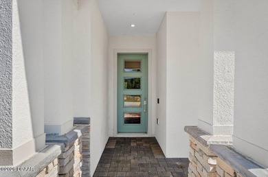 Welcome to The Lydia, a CFB Award-winning home that blends on LPGA International Golf Course in Florida - for sale on GolfHomes.com, golf home, golf lot