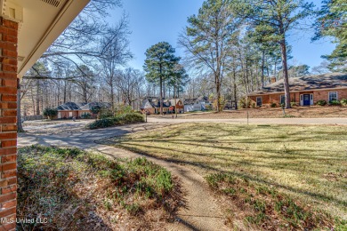 Discover this beautifully updated 3-bedroom, 2-bathroom home on Castlewoods Golf Club in Mississippi - for sale on GolfHomes.com, golf home, golf lot
