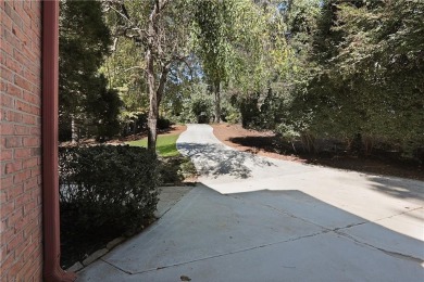Nestled within the prestigious, gated enclave of Country Club of on Country Club of the South in Georgia - for sale on GolfHomes.com, golf home, golf lot