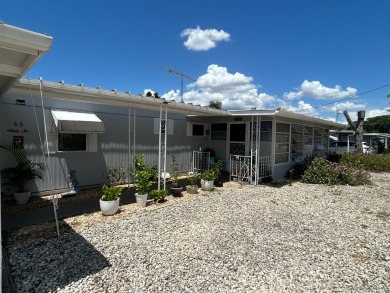 Free boat dock with access to the Dora Canal. The sunroom offers on Bay Tree Golf Course in Florida - for sale on GolfHomes.com, golf home, golf lot