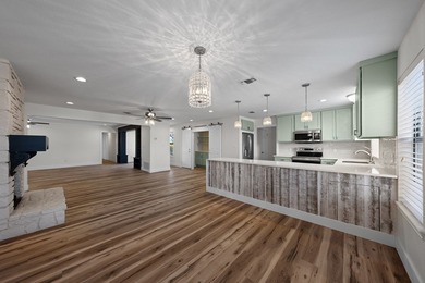 Stunning, fully remodeled 3-bedroom home + office in the on Riverhill Country Club in Texas - for sale on GolfHomes.com, golf home, golf lot