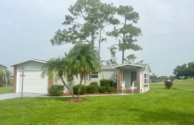 **Beautiful Home on the 17th green in Pine Lakes Country Club** on Pine Lakes Country Club in Florida - for sale on GolfHomes.com, golf home, golf lot