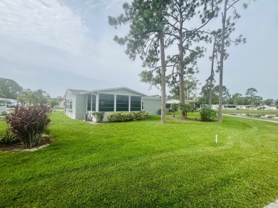 **Beautiful Home on the 17th green in Pine Lakes Country Club** on Pine Lakes Country Club in Florida - for sale on GolfHomes.com, golf home, golf lot