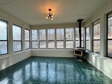 A charming home nestled in the heart of Bella Vista, AR on Bella Vista Country Club - Berksdale in Arkansas - for sale on GolfHomes.com, golf home, golf lot