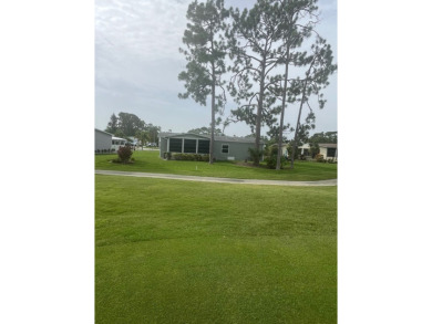 **Beautiful Home on the 17th green in Pine Lakes Country Club** on Pine Lakes Country Club in Florida - for sale on GolfHomes.com, golf home, golf lot