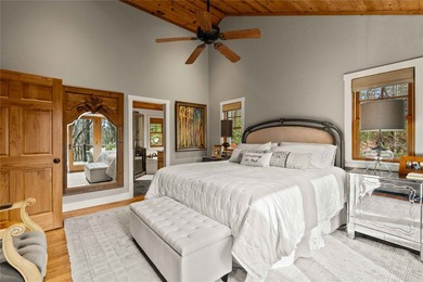 Nestled in a serene, wooded setting, this charming home offers on Sapphire National Golf Club in North Carolina - for sale on GolfHomes.com, golf home, golf lot