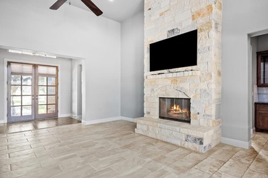 Beautiful single-family home sits overlooking the green of Hole on The Club At Comanche Trace in Texas - for sale on GolfHomes.com, golf home, golf lot