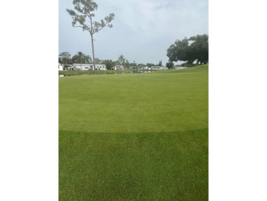**Beautiful Home on the 17th green in Pine Lakes Country Club** on Pine Lakes Country Club in Florida - for sale on GolfHomes.com, golf home, golf lot