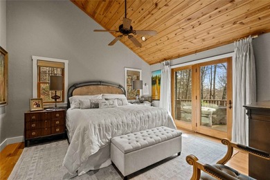 Nestled in a serene, wooded setting, this charming home offers on Sapphire National Golf Club in North Carolina - for sale on GolfHomes.com, golf home, golf lot