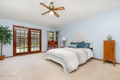 Nestled in the guard-gated Spruce Creek Fly-In community, this on Spruce Creek Golf Club in Florida - for sale on GolfHomes.com, golf home, golf lot
