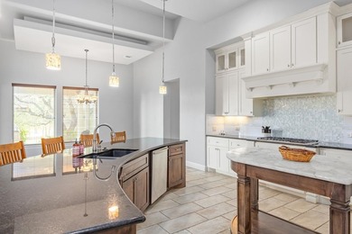 Beautiful single-family home sits overlooking the green of Hole on The Club At Comanche Trace in Texas - for sale on GolfHomes.com, golf home, golf lot