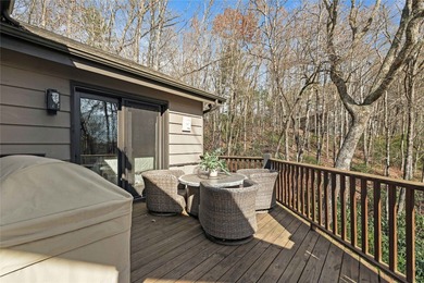 Nestled in a serene, wooded setting, this charming home offers on Sapphire National Golf Club in North Carolina - for sale on GolfHomes.com, golf home, golf lot