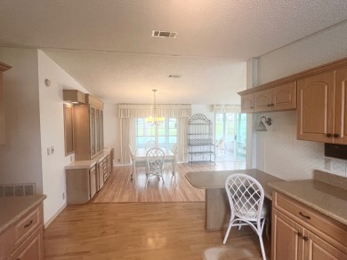 **Beautiful Home on the 17th green in Pine Lakes Country Club** on Pine Lakes Country Club in Florida - for sale on GolfHomes.com, golf home, golf lot