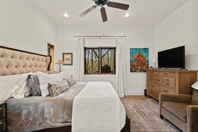 Nestled in a serene, wooded setting, this charming home offers on Sapphire National Golf Club in North Carolina - for sale on GolfHomes.com, golf home, golf lot