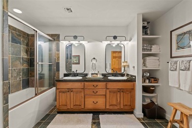 Nestled in a serene, wooded setting, this charming home offers on Sapphire National Golf Club in North Carolina - for sale on GolfHomes.com, golf home, golf lot