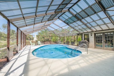 Nestled in the guard-gated Spruce Creek Fly-In community, this on Spruce Creek Golf Club in Florida - for sale on GolfHomes.com, golf home, golf lot