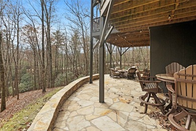 Nestled in a serene, wooded setting, this charming home offers on Sapphire National Golf Club in North Carolina - for sale on GolfHomes.com, golf home, golf lot