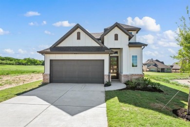 Our Country Homes Jewel Series Villa home is under construction on The Golf Club at Resort Eagle Mountain Lake in Texas - for sale on GolfHomes.com, golf home, golf lot