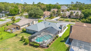 Nestled in the guard-gated Spruce Creek Fly-In community, this on Spruce Creek Golf Club in Florida - for sale on GolfHomes.com, golf home, golf lot