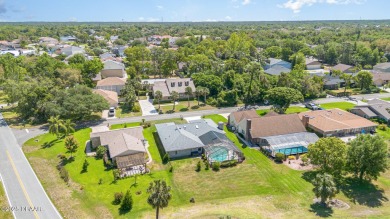 Nestled in the guard-gated Spruce Creek Fly-In community, this on Spruce Creek Golf Club in Florida - for sale on GolfHomes.com, golf home, golf lot