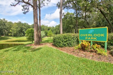 Nestled in the guard-gated Spruce Creek Fly-In community, this on Spruce Creek Golf Club in Florida - for sale on GolfHomes.com, golf home, golf lot