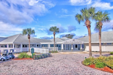 Nestled in the guard-gated Spruce Creek Fly-In community, this on Spruce Creek Golf Club in Florida - for sale on GolfHomes.com, golf home, golf lot