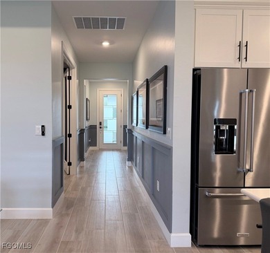 Skip the wait for new construction-this well-appointed Mystique on Babcock National Golf Course in Florida - for sale on GolfHomes.com, golf home, golf lot