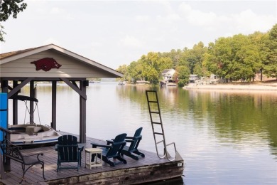 Gorgeous Lake Front Home w/ Private Dock! This 4-bedroom home on Bella Vista Country Club - Berksdale in Arkansas - for sale on GolfHomes.com, golf home, golf lot