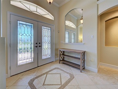Upon entering the home, you will notice how light and bright it on Rotonda Golf and Country Club - Long Marsh  in Florida - for sale on GolfHomes.com, golf home, golf lot