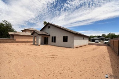 3 Bedroom 2 Bath home on a 7900 sq ft lot. Tile floors and on The Links At Coyote Wash in Arizona - for sale on GolfHomes.com, golf home, golf lot
