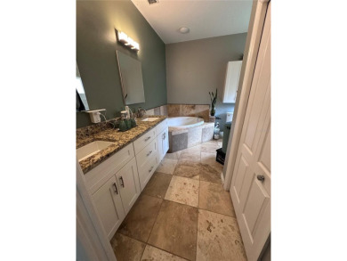 Coastal charm meets convenience in this beautifully kept on University Park Country Club in Florida - for sale on GolfHomes.com, golf home, golf lot