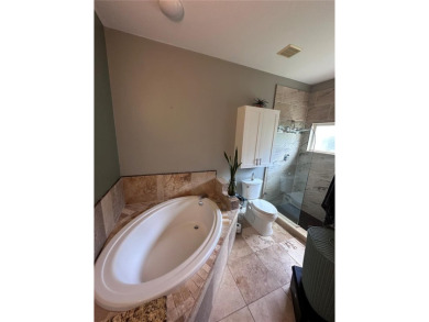 Coastal charm meets convenience in this beautifully kept on University Park Country Club in Florida - for sale on GolfHomes.com, golf home, golf lot