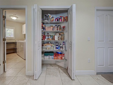 Upon entering the home, you will notice how light and bright it on Rotonda Golf and Country Club - Long Marsh  in Florida - for sale on GolfHomes.com, golf home, golf lot