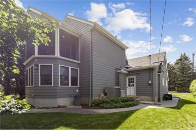 Welcome to this beautifully maintained and updated two-story on Interlachen Country Club in Minnesota - for sale on GolfHomes.com, golf home, golf lot