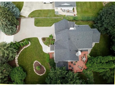 Welcome to this beautifully maintained and updated two-story on Interlachen Country Club in Minnesota - for sale on GolfHomes.com, golf home, golf lot