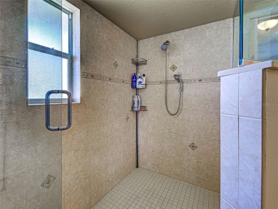 Upon entering the home, you will notice how light and bright it on Rotonda Golf and Country Club - Long Marsh  in Florida - for sale on GolfHomes.com, golf home, golf lot