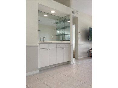 Looking for a light and airy comfortable unit to call home, well on Hammock Bay in Florida - for sale on GolfHomes.com, golf home, golf lot