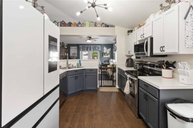 Welcome to this beautifully maintained 4-bedroom, 2-bathroom on Royal St. Cloud Golf Links in Florida - for sale on GolfHomes.com, golf home, golf lot