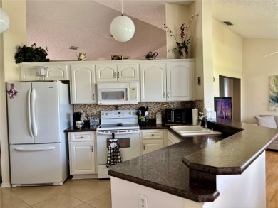 Be among the first to see this move-in ready expanded Kingston on Caloosa Greens Executive Golf Course in Florida - for sale on GolfHomes.com, golf home, golf lot