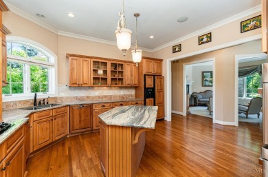 Luxury living with panoramic golf course views! Custom built by on Four Bridges Country Club in Ohio - for sale on GolfHomes.com, golf home, golf lot