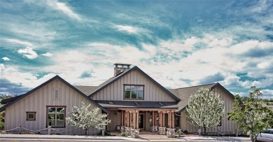 Capture the essence of a tranquil lifestyle at this exceptional on Polson Bay Golf Course - Championship Course in Montana - for sale on GolfHomes.com, golf home, golf lot