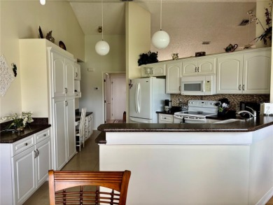 Be among the first to see this move-in ready expanded Kingston on Caloosa Greens Executive Golf Course in Florida - for sale on GolfHomes.com, golf home, golf lot