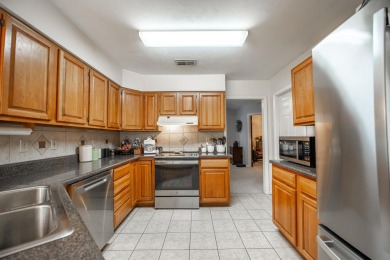 Welcome to this charming 3-bedroom, 2-bath home with an office on Killearn Country Club and Inn in Florida - for sale on GolfHomes.com, golf home, golf lot