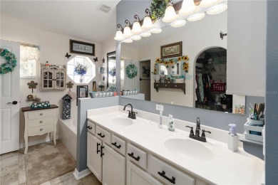 Welcome to this beautifully maintained 4-bedroom, 2-bathroom on Royal St. Cloud Golf Links in Florida - for sale on GolfHomes.com, golf home, golf lot