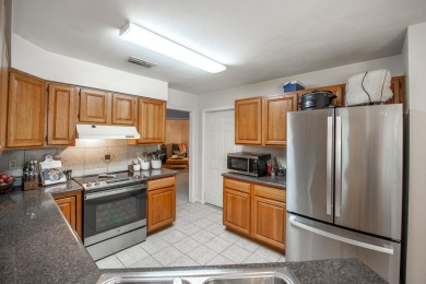 Welcome to this charming 3-bedroom, 2-bath home with an office on Killearn Country Club and Inn in Florida - for sale on GolfHomes.com, golf home, golf lot